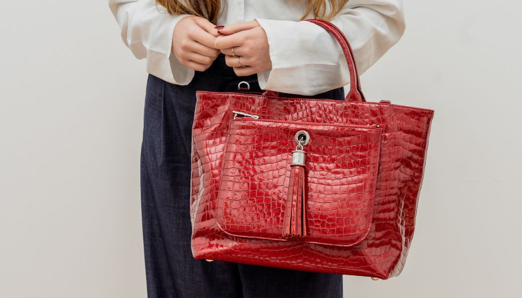 Why Every Wardrobe Needs a Patent Croc Bag