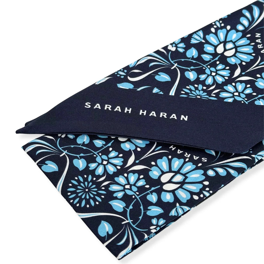 Blue Daisy Sarah Haran Complimentary Gift Q4 Reservation Silk Scarf hardware detail | U59-N