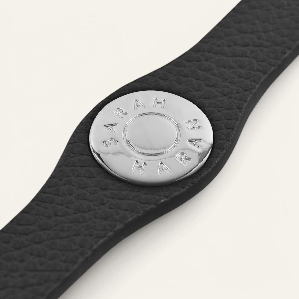 Black Sarah Haran Deco Logo with Silver hardware detail