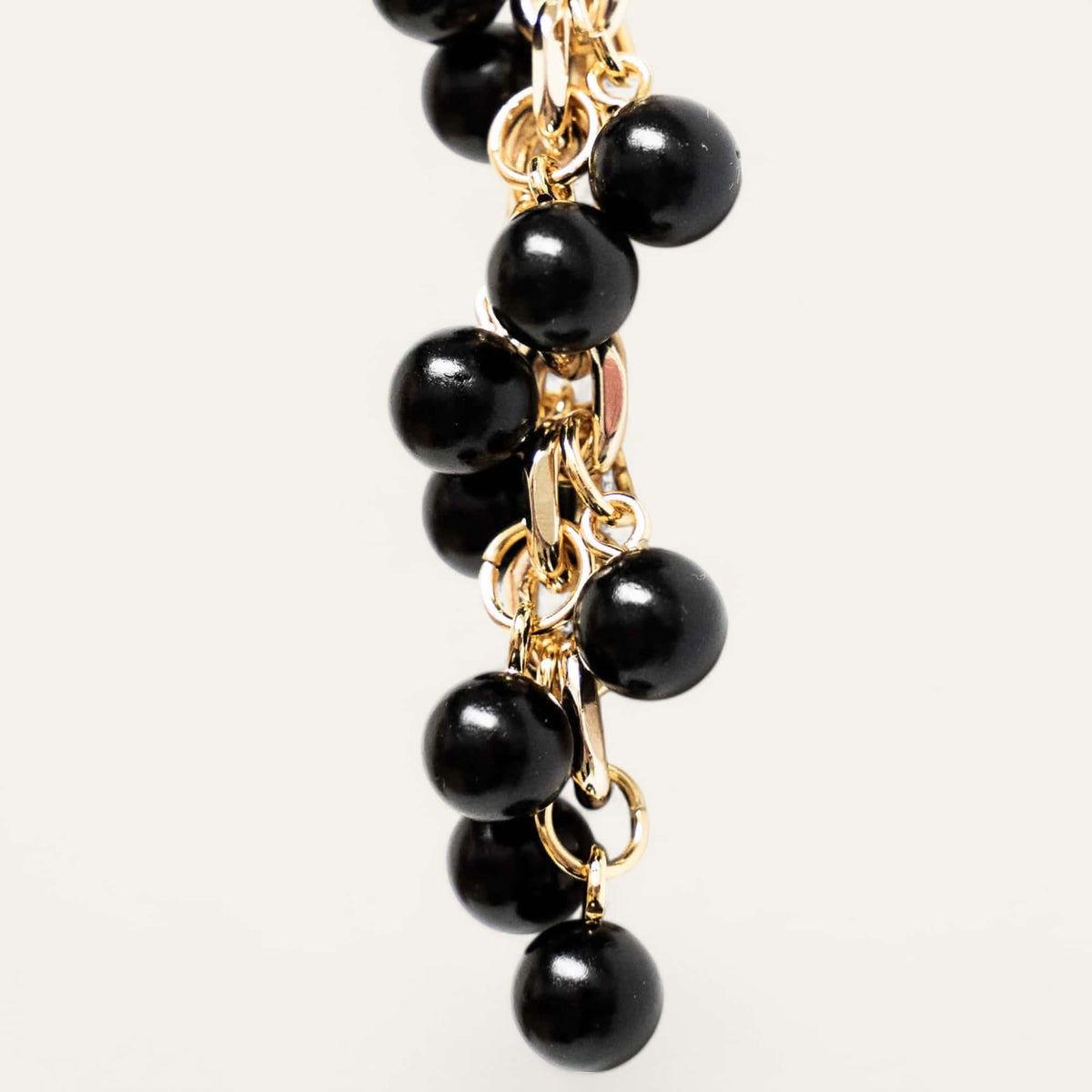 Black Sarah Haran Venus Tassel Gold Detail