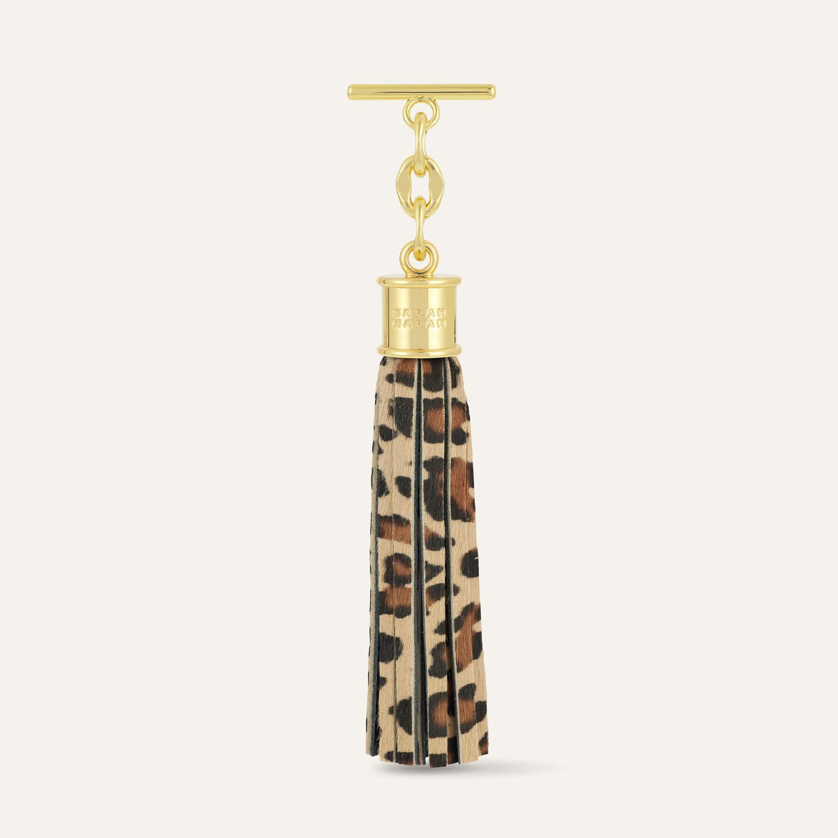 Leopard Sarah Haran Capsule Tassel with Gold hardware front