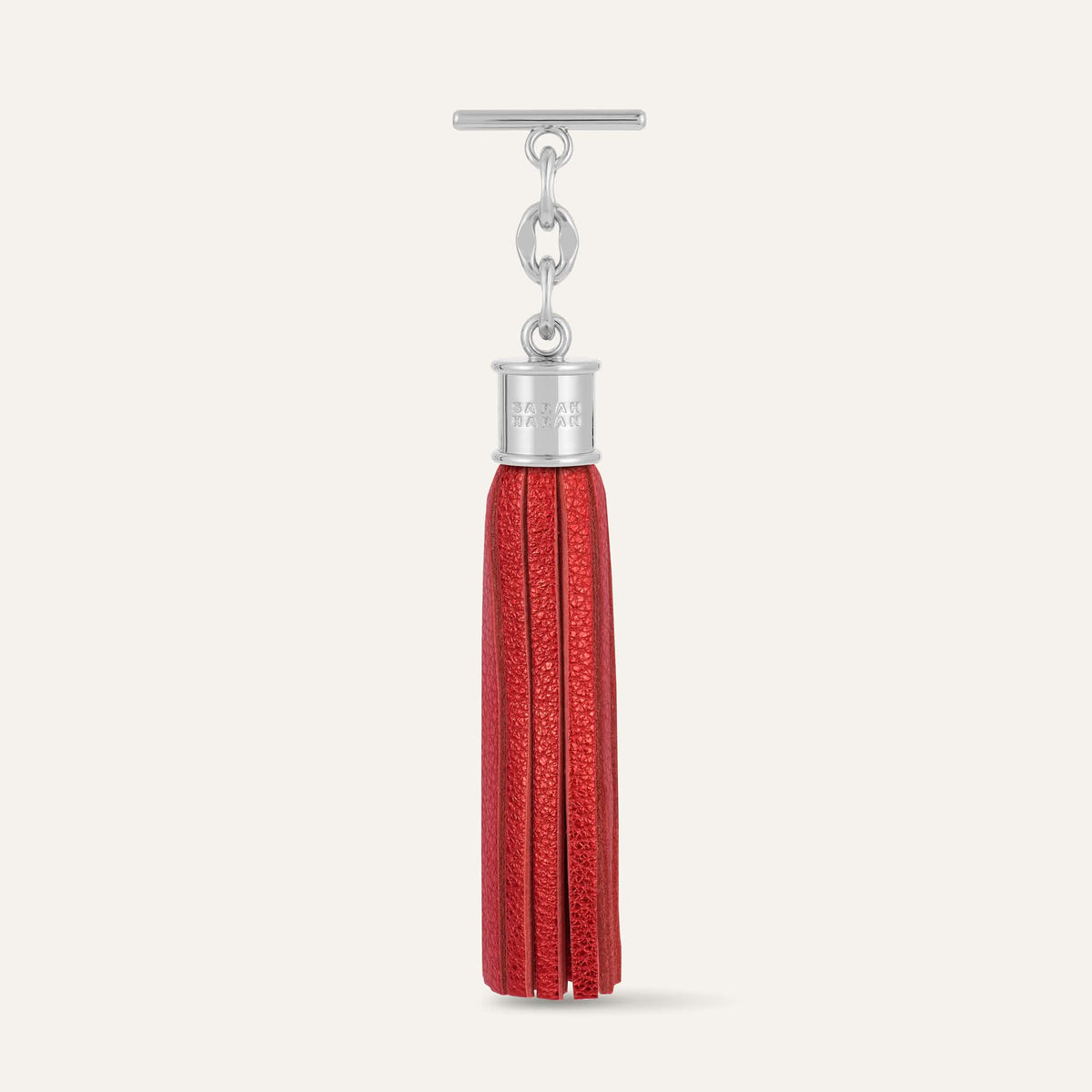 Metallic Red Sarah Haran Capsule Tassel with Silver hardware front