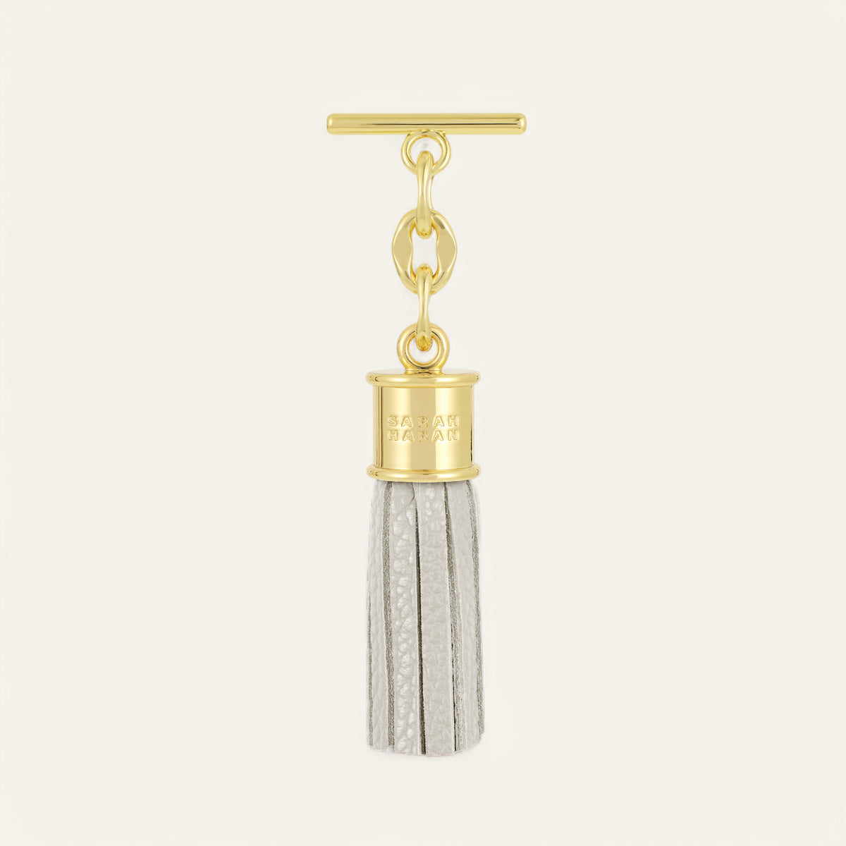 Porcelain Sarah Haran Mini Capsule Tassel with Gold hardware Front