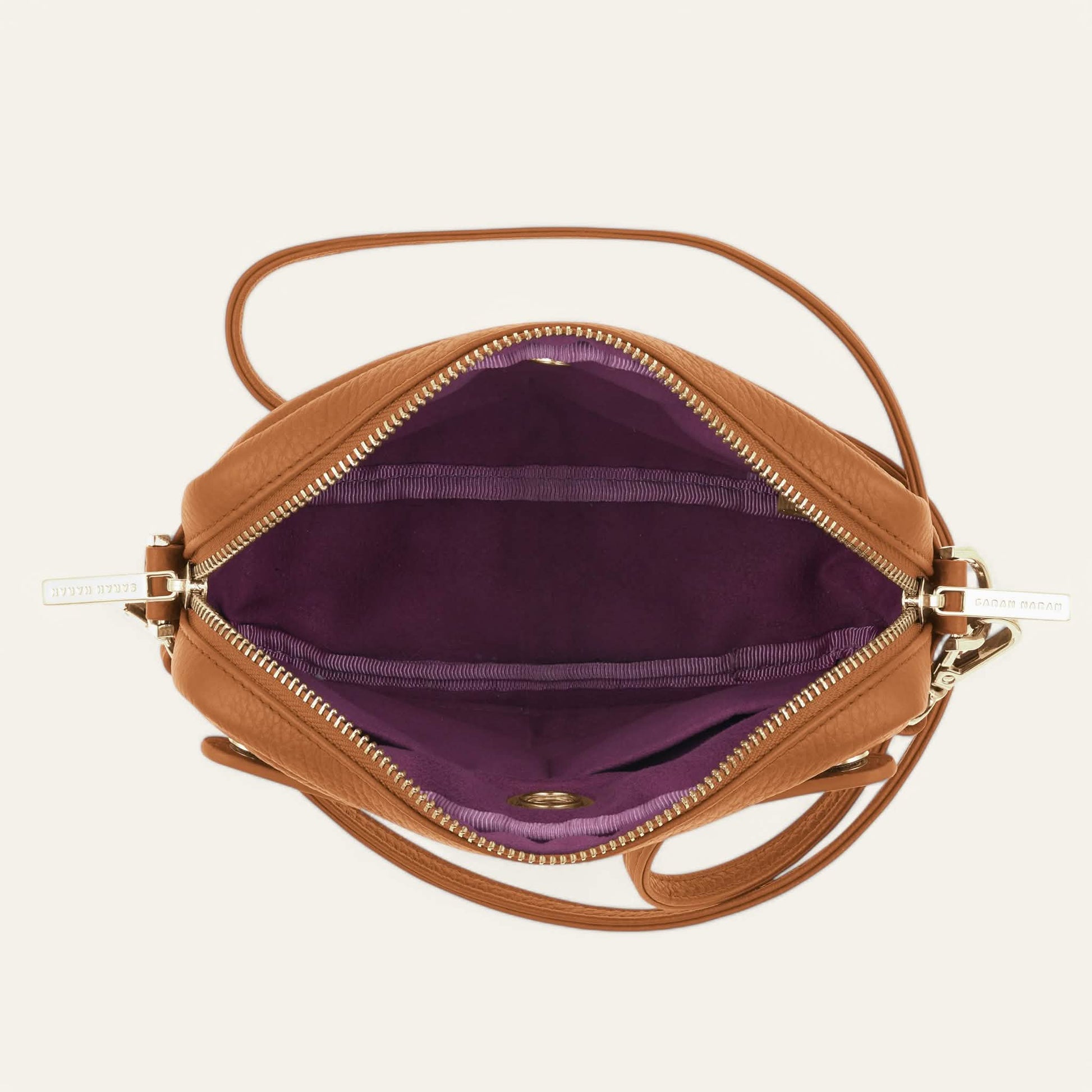 Tan Sarah Haran Millie Crossbody with Gold hardware overhead