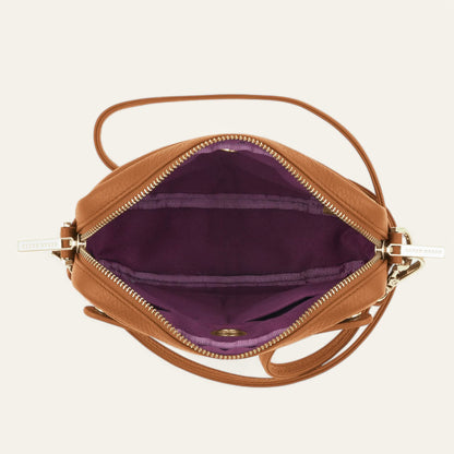 Tan Sarah Haran Millie Crossbody with Gold hardware overhead